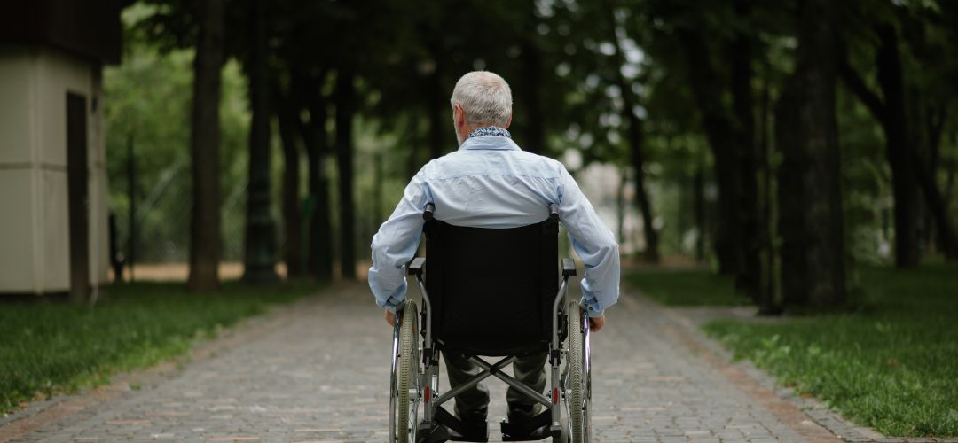 Image of a man in a wheelchair